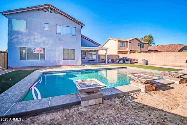 view of swimming pool with a fenced in pool and a fenced backyard