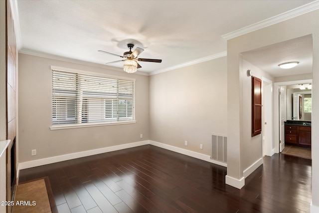unfurnished room featuring baseboards, ceiling fan, visible vents, and dark wood finished floors