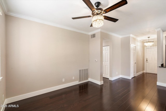 spare room with dark wood finished floors, ceiling fan with notable chandelier, baseboards, and visible vents