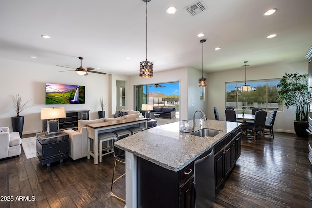 7432 W Bronco Trl, Peoria, AZ 85383 - kitchen featuring a sink, dishwasher, ceiling fan, healthy amount of natural light, and recessed lighting