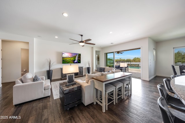 7432 W Bronco Trl, Peoria, AZ 85383 - living area with a ceiling fan, recessed lighting, baseboards, and dark wood-style flooring