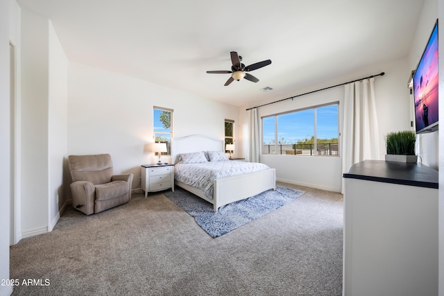 7432 W Bronco Trl, Peoria, AZ 85383 - carpeted bedroom featuring baseboards and ceiling fan