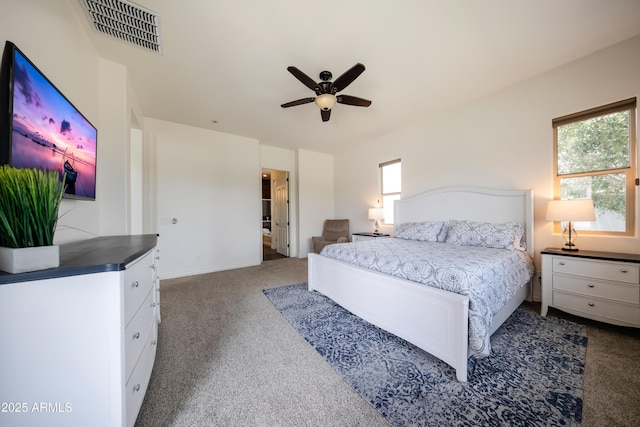 7432 W Bronco Trl, Peoria, AZ 85383 - carpeted bedroom with multiple windows and ceiling fan