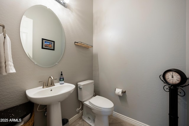 7432 W Bronco Trl, Peoria, AZ 85383 - bathroom with toilet, baseboards, and tile patterned floors