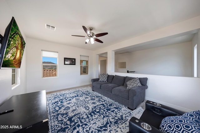 7432 W Bronco Trl, Peoria, AZ 85383 - living room featuring ceiling fan and baseboards