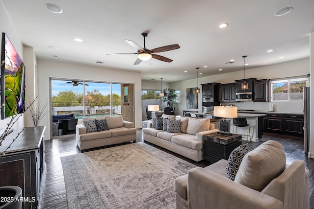 7432 W Bronco Trl, Peoria, AZ 85383 - living room with a ceiling fan, healthy amount of natural light, recessed lighting, and dark wood finished floors