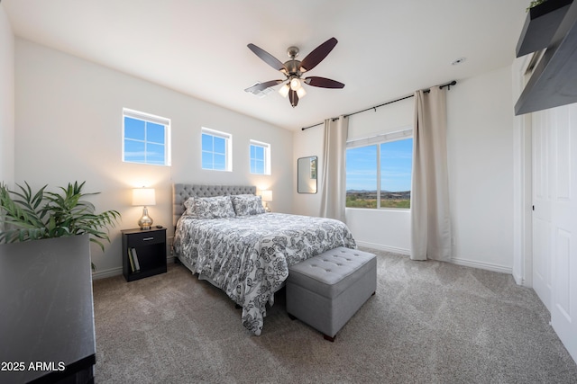 7432 W Bronco Trl, Peoria, AZ 85383 - bedroom featuring carpet floors, baseboards, and a ceiling fan