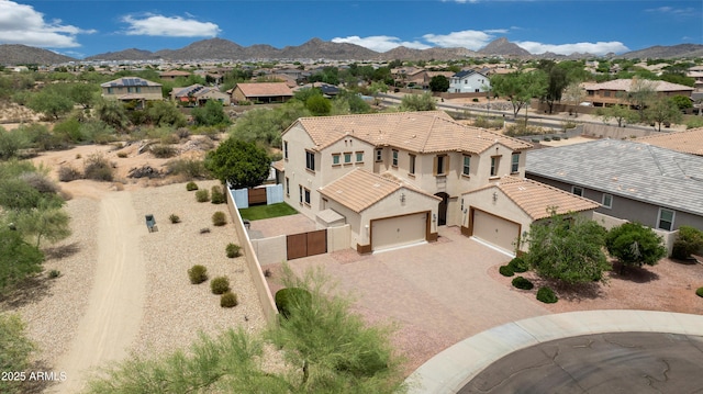 7432 W Bronco Trl, Peoria, AZ 85383 - aerial view of residential area with a mountain backdrop