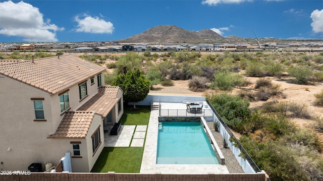 7432 W Bronco Trl, Peoria, AZ 85383 - view of swimming pool featuring a mountain view, a fenced backyard, a patio area, and a residential view