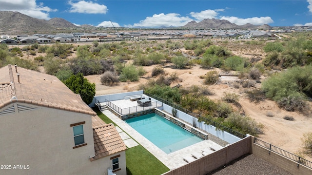 7432 W Bronco Trl, Peoria, AZ 85383 - view of swimming pool with a fenced backyard and a mountain view