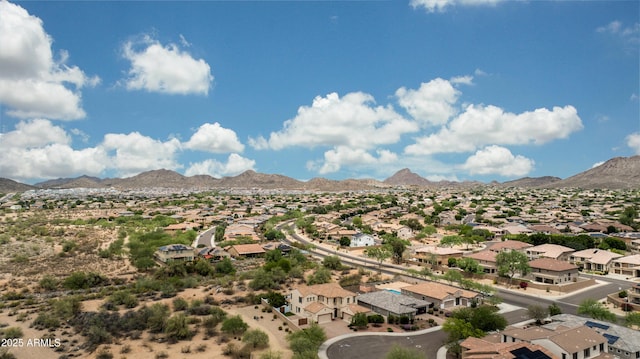 7432 W Bronco Trl, Peoria, AZ 85383 - aerial perspective of suburban area featuring a mountainous background