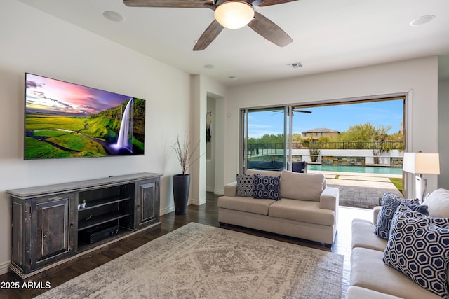 7432 W Bronco Trl, Peoria, AZ 85383 - living room with baseboards, ceiling fan, and wood finished floors