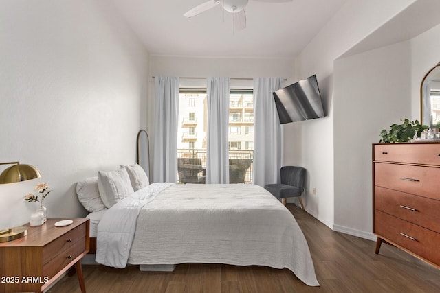 bedroom featuring dark hardwood / wood-style floors and ceiling fan