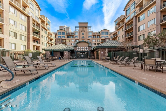 view of swimming pool featuring a gazebo and a patio