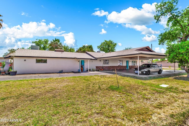 1451 E Brown Rd, Mesa, AZ 85203 - view of front of house with a front lawn and an attached carport