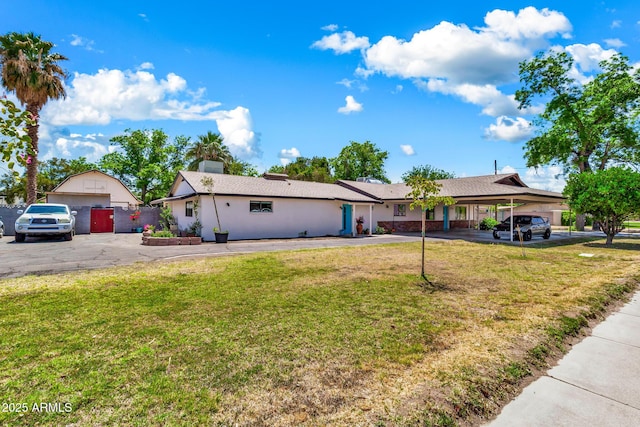 1451 E Brown Rd, Mesa, AZ 85203 - ranch-style home with a front lawn