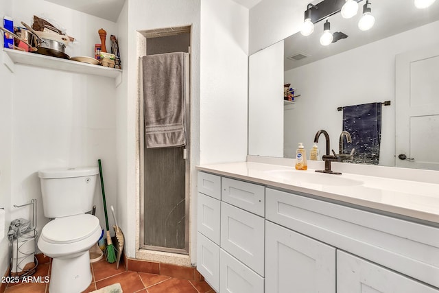 1451 E Brown Rd, Mesa, AZ 85203 - bathroom with tile patterned flooring, vanity, toilet, a shower stall, and visible vents