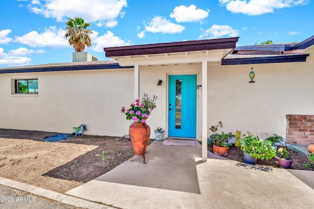 1451 E Brown Rd, Mesa, AZ 85203 - entrance to property featuring a patio and stucco siding