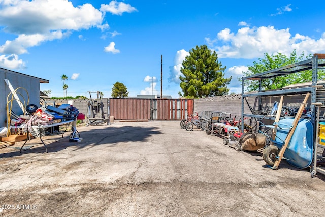 1451 E Brown Rd, Mesa, AZ 85203 - view of patio / terrace with fence and a gate