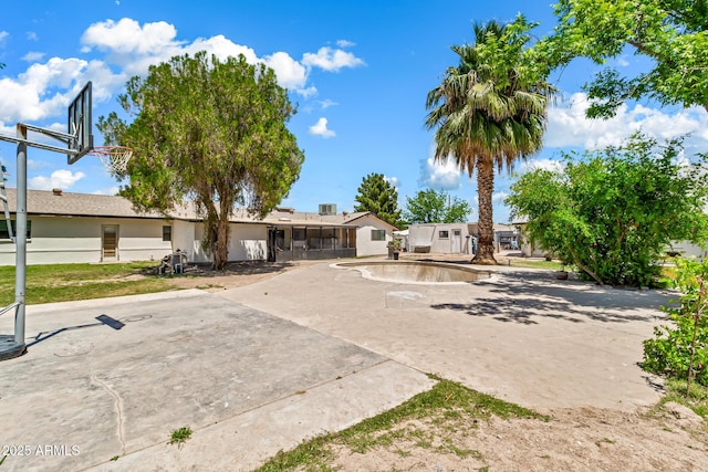 1451 E Brown Rd, Mesa, AZ 85203 - ranch-style home with a patio, an outdoor pool, and community basketball court