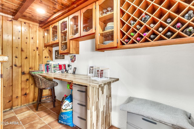 1451 E Brown Rd, Mesa, AZ 85203 - bar with wooden walls, wooden ceiling, and light tile patterned flooring