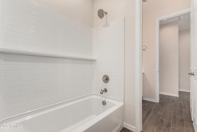 bathroom with shower / bath combination