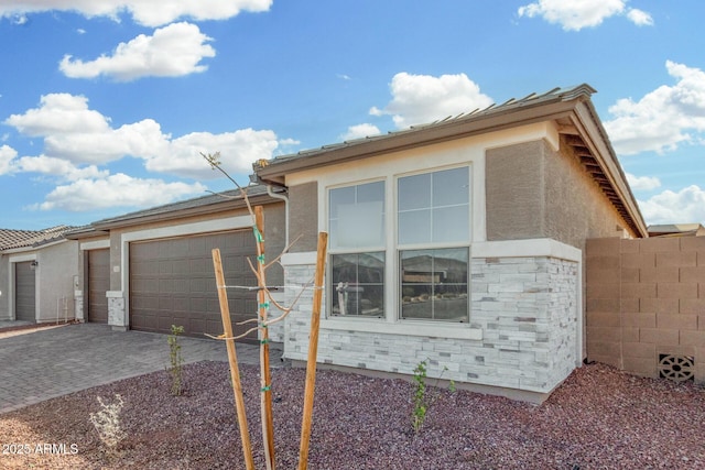 view of property exterior with a garage