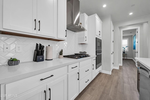 31435 N 130th Ave, Peoria, AZ 85383 - kitchen with tasteful backsplash, baseboards, wall chimney range hood, light countertops, and appliances with stainless steel finishes