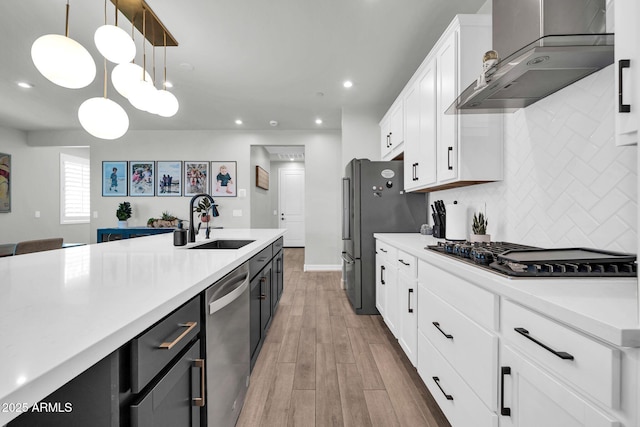 31435 N 130th Ave, Peoria, AZ 85383 - kitchen featuring stainless steel appliances, a sink, wall chimney exhaust hood, decorative backsplash, and white cabinetry