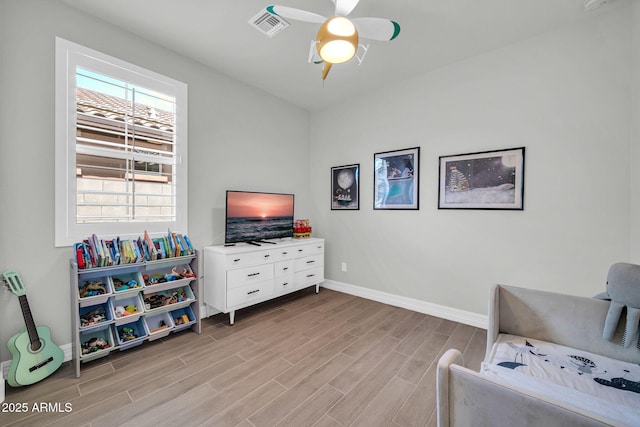 31435 N 130th Ave, Peoria, AZ 85383 - sitting room with light wood-type flooring, visible vents, a ceiling fan, and baseboards