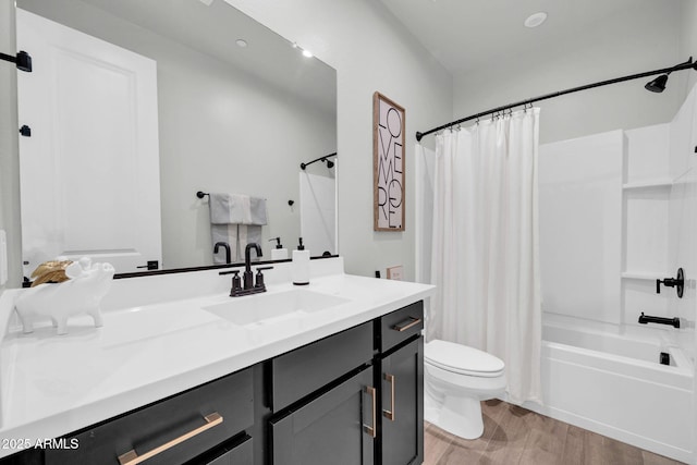 31435 N 130th Ave, Peoria, AZ 85383 - bathroom featuring shower / bath combo with shower curtain, wood finished floors, vanity, and toilet