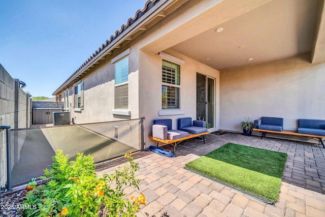 31435 N 130th Ave, Peoria, AZ 85383 - view of patio / terrace featuring fence, an outdoor hangout area, and central AC unit