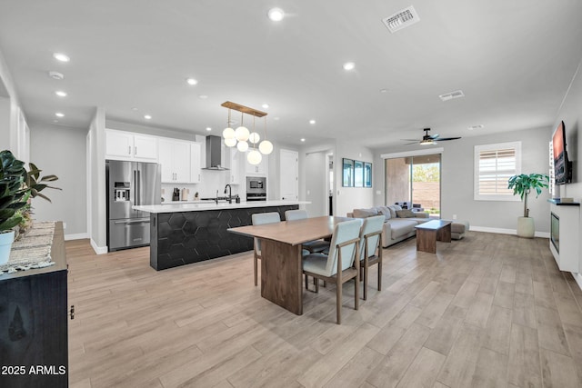 31435 N 130th Ave, Peoria, AZ 85383 - dining space featuring recessed lighting, a ceiling fan, visible vents, and light wood-type flooring