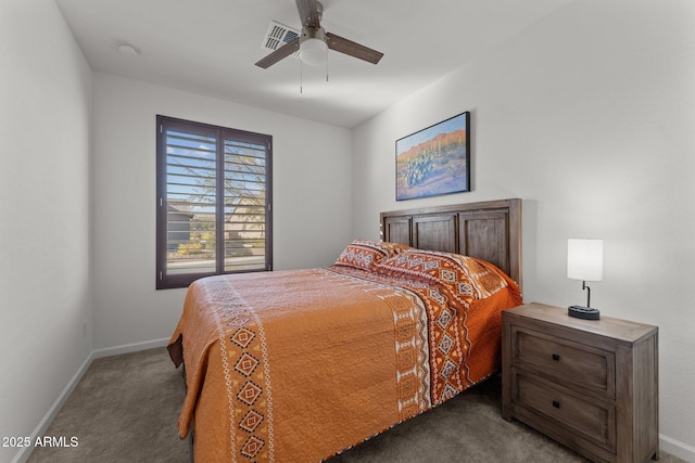 bedroom featuring ceiling fan and dark carpet