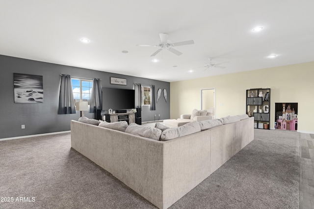 carpeted living area with recessed lighting, baseboards, and a ceiling fan