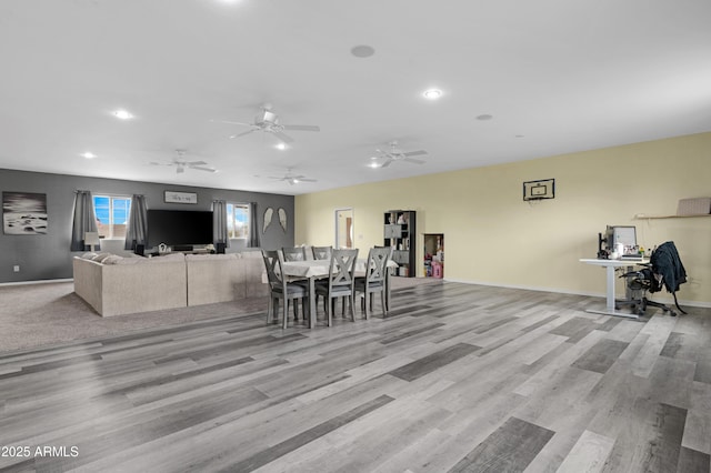 dining area with recessed lighting, baseboards, and light wood-style floors