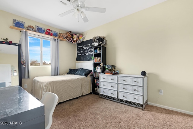 bedroom with baseboards, carpet floors, visible vents, and a ceiling fan