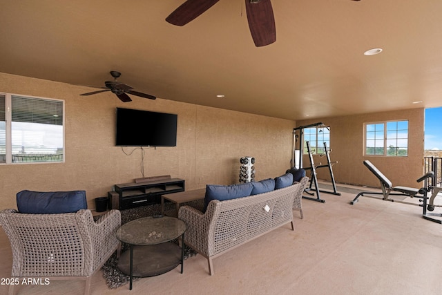 view of patio / terrace with a ceiling fan and an outdoor hangout area