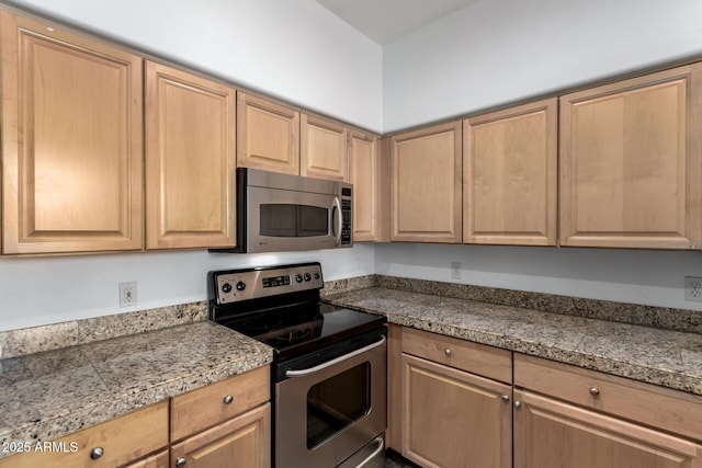 19777 N 76th St Unit 2244, Scottsdale, AZ 85255 - kitchen with light brown cabinetry and appliances with stainless steel finishes