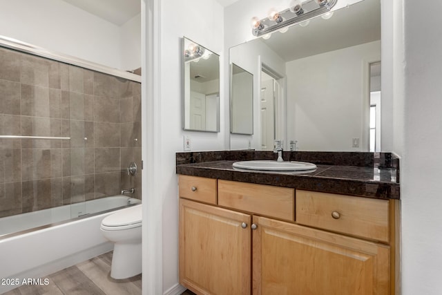 19777 N 76th St Unit 2244, Scottsdale, AZ 85255 - bathroom with toilet, shower / bathtub combination, wood finished floors, and vanity