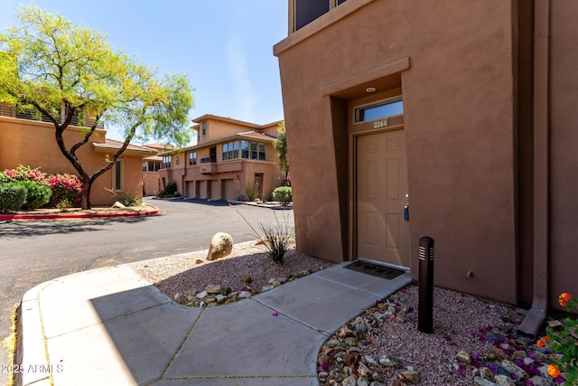 19777 N 76th St Unit 2244, Scottsdale, AZ 85255 - view of exterior entry with stucco siding
