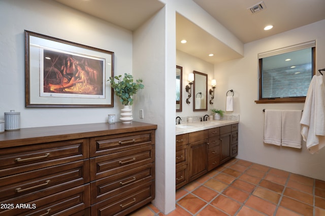 4885 N Via De La Granja, Tucson, AZ 85718 - bathroom with double vanity, recessed lighting, and tile patterned flooring