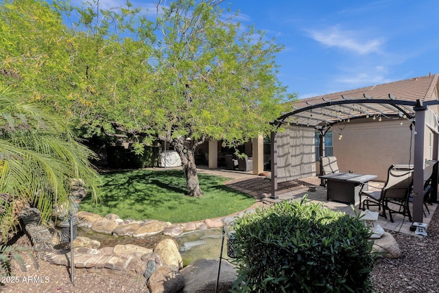 view of yard featuring a pergola and a patio