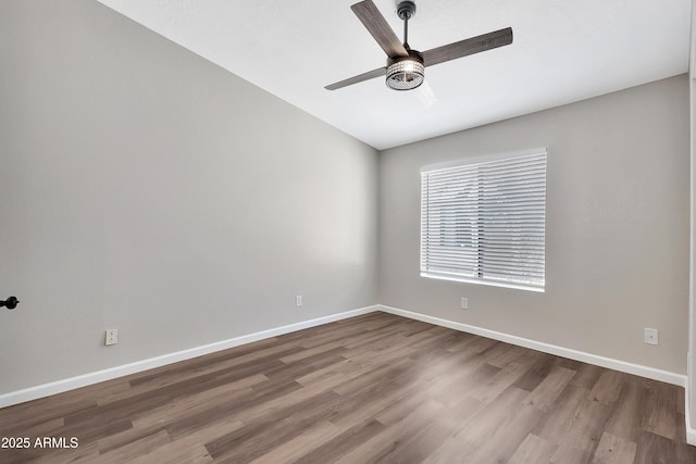 unfurnished room featuring ceiling fan and wood-type flooring