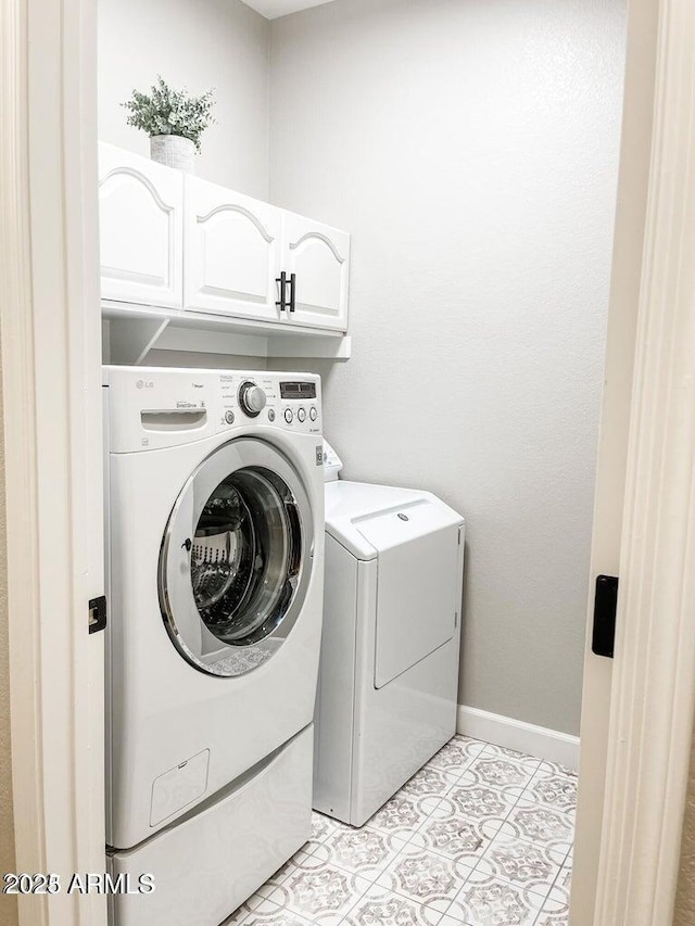 40618 N Apollo Way, Anthem, AZ 85086 - laundry room featuring cabinet space, washer and dryer, and baseboards