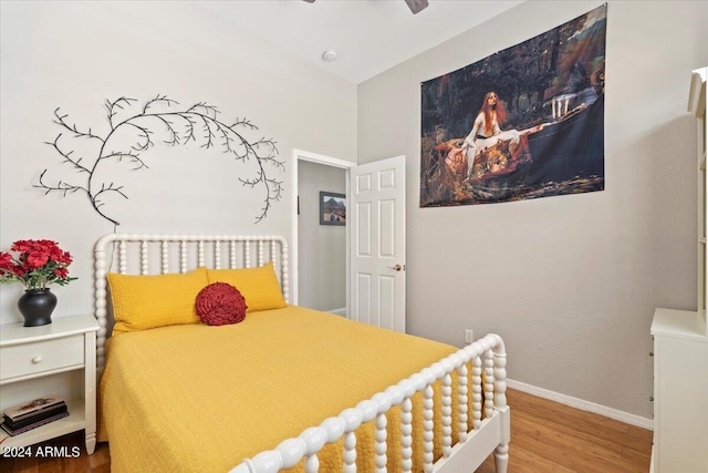 bedroom featuring hardwood / wood-style flooring