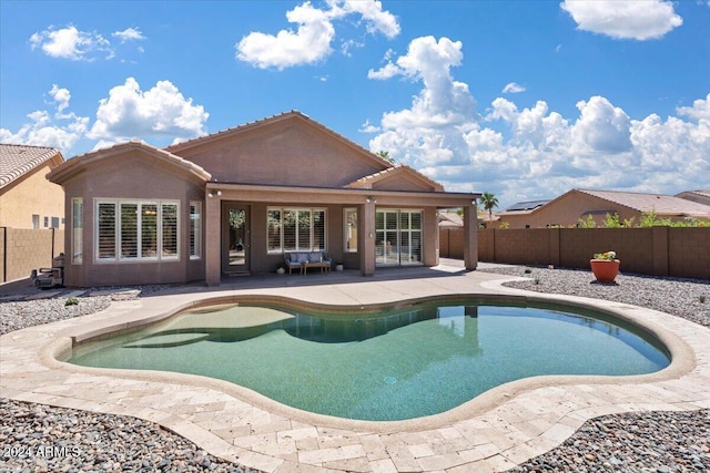 view of swimming pool featuring a patio