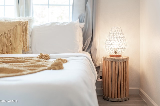 bedroom featuring wood-type flooring