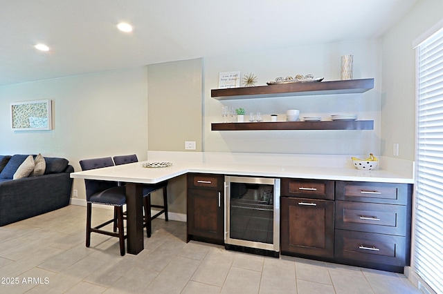 4600 N 68th St Unit 351, Scottsdale, AZ 85251 - indoor dry bar with beverage cooler, recessed lighting, and light tile patterned flooring
