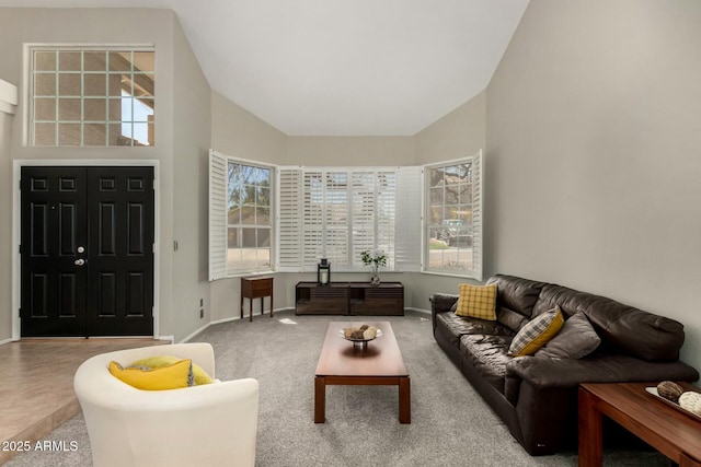 16047 S 14th Dr, Phoenix, AZ 85045 - living area featuring baseboards, high vaulted ceiling, and carpet floors
